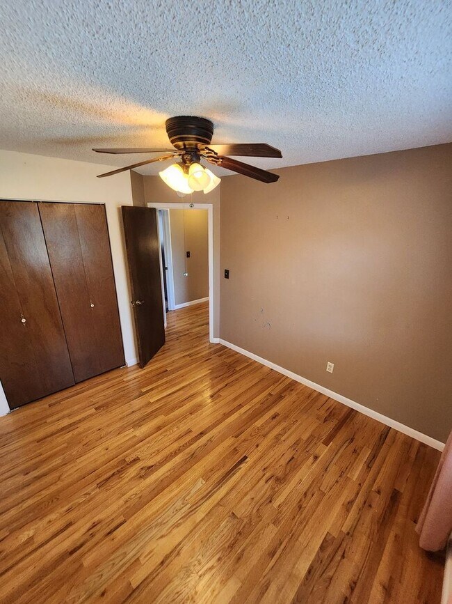 Building Photo - Spacious 4-Bedroom Home with RV Parking in...