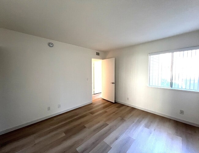 Building Photo - Ground Level 2 Bedroom Condo with Private Patio in Gated Community for Lease