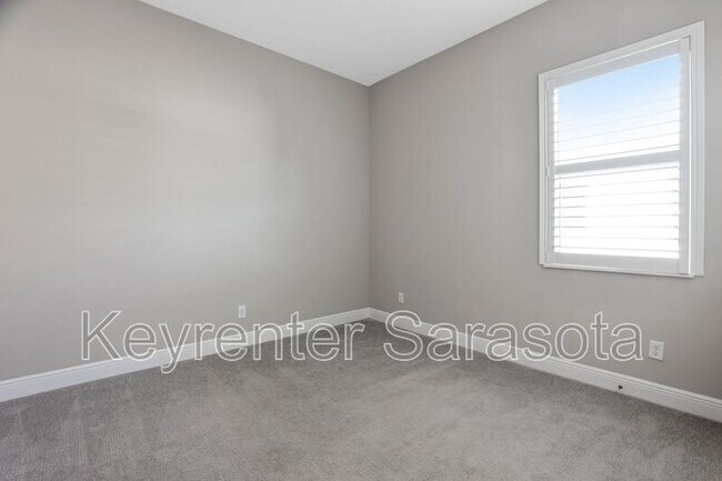 Building Photo - 6133 Lungo Lago Dr