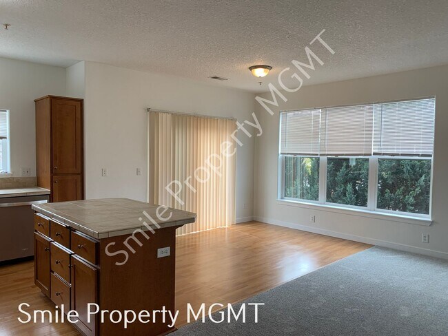Building Photo - A great condo with 2 bedrooms and 2.5 bathrooms, single car garage in gated community in Happy Va...