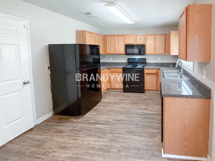Building Photo - 7132 Bowie Dr