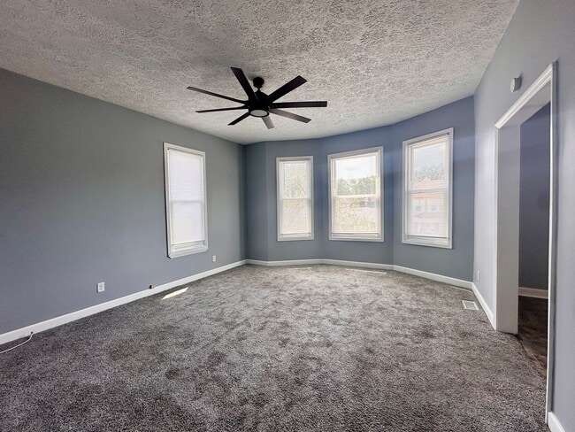 Building Photo - Step into charm, comfort, and convenience in the heart of Historic Farrington’s Grove!