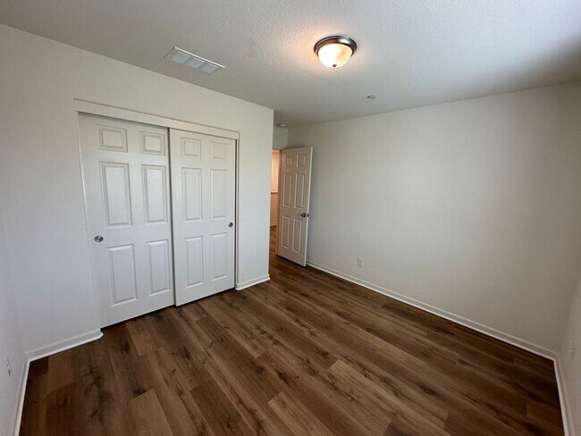Building Photo - Stunning 4 Bedroom, 3 Bath Gated Community W/ Solar