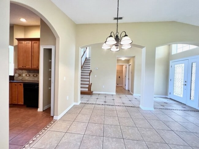 Building Photo - EAGLE CREEK LAKE NONA! WELCOME HOME! Beautiful water views! Spacious 2 story-3 bedroom 2.5 bath h...