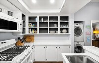 Building Photo - This one is model perfect.  Who will be th...