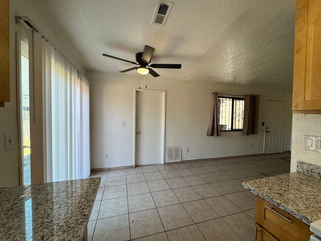 Building Photo - Two Bed, One Bath Triplex with a One Car Garage In North Stockton