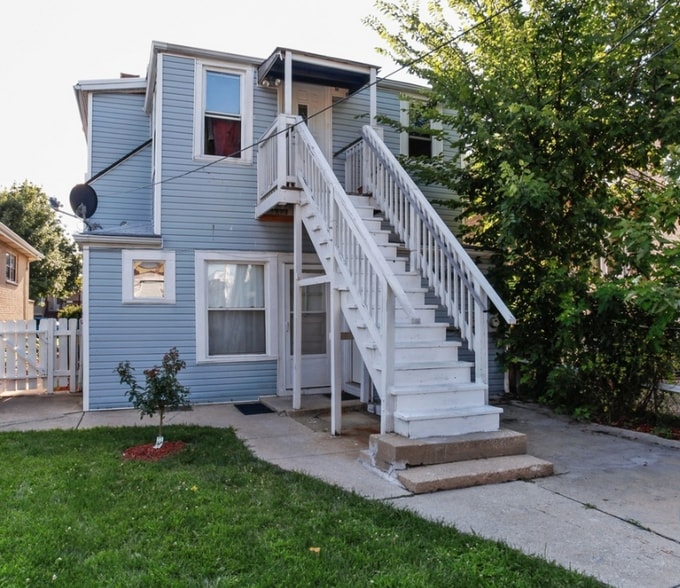 Second floor unit - entry from back yard - 2835 S Harvey Ave