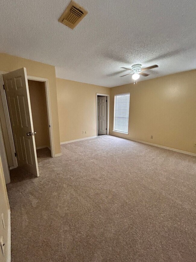 Building Photo - W/S/T included! Dbl garage! 2BR/2.5BA with...