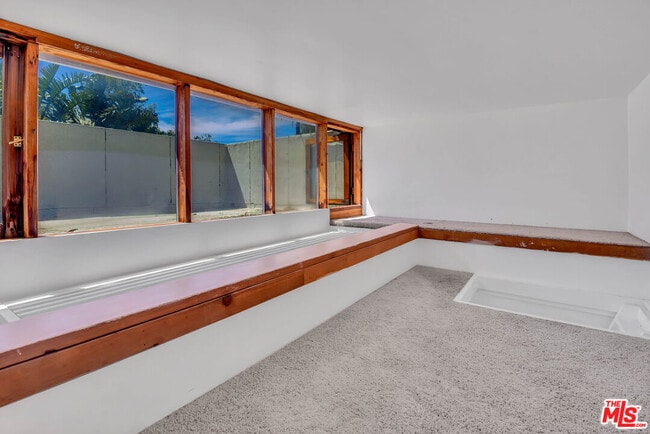 Building Photo - 6456 Surfside Way