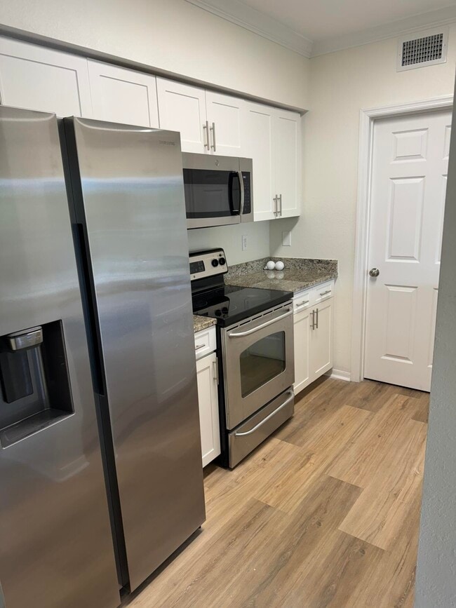 Building Photo - 6559 Emerald Dunes Dr