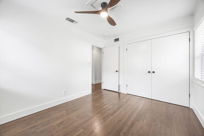 Building Photo - **$40K+ IN UPGRADES AND A FENCED BACKYARD WITH TWO STORAGE BUILDINGS**
