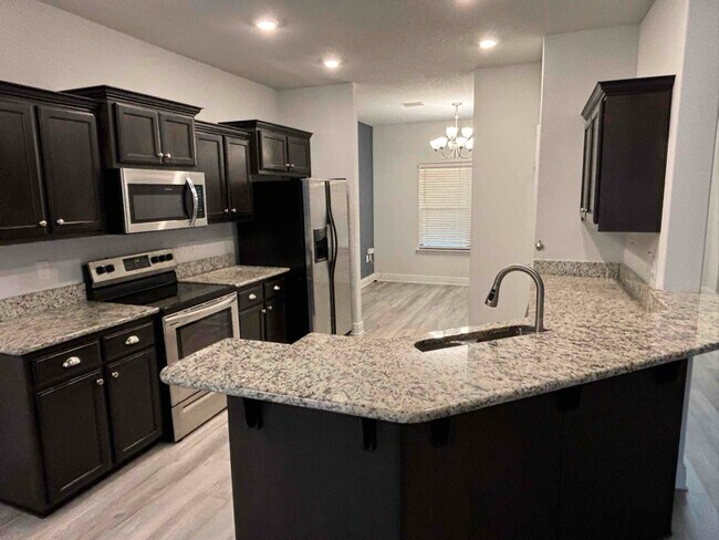 Building Photo - 5747 Periwinkle Ln