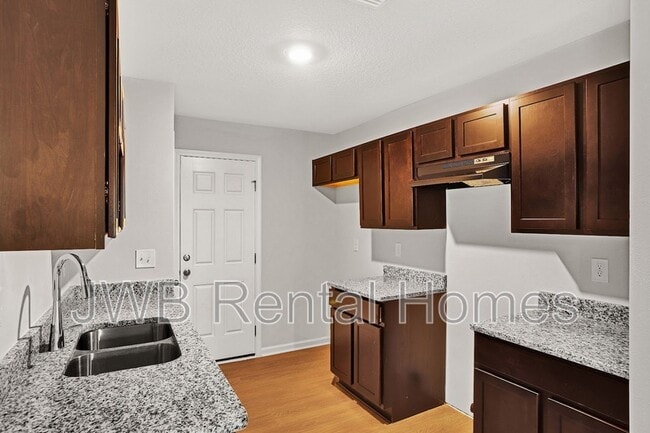 Building Photo - 6009 Dunmire Ave