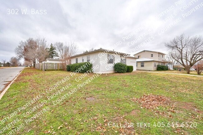 Building Photo - 302 W. Bass-