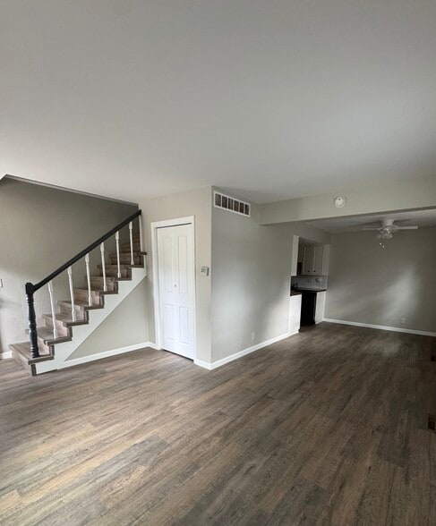 View of living room and dining room - 7725 W Nantucket St