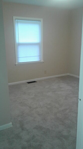 Bedrooms have fresh paint and new carpet - 1654 Pell Dr