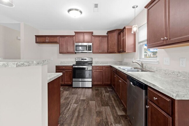 Building Photo - Minutes to Back Gate & Beaches!