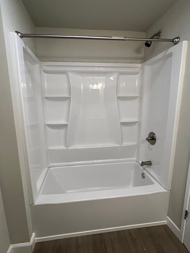 Building Photo - NEWLY REMODELED! 3+ bed, 1.5 bath, a/c, d/w, lots of off street parking!