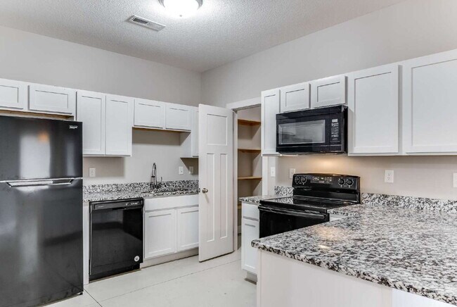 Building Photo - "Charming 3-Bedroom Duplex Retreat with 2 Full Baths in Wichita – 1190 Sq Ft of Comfort!"