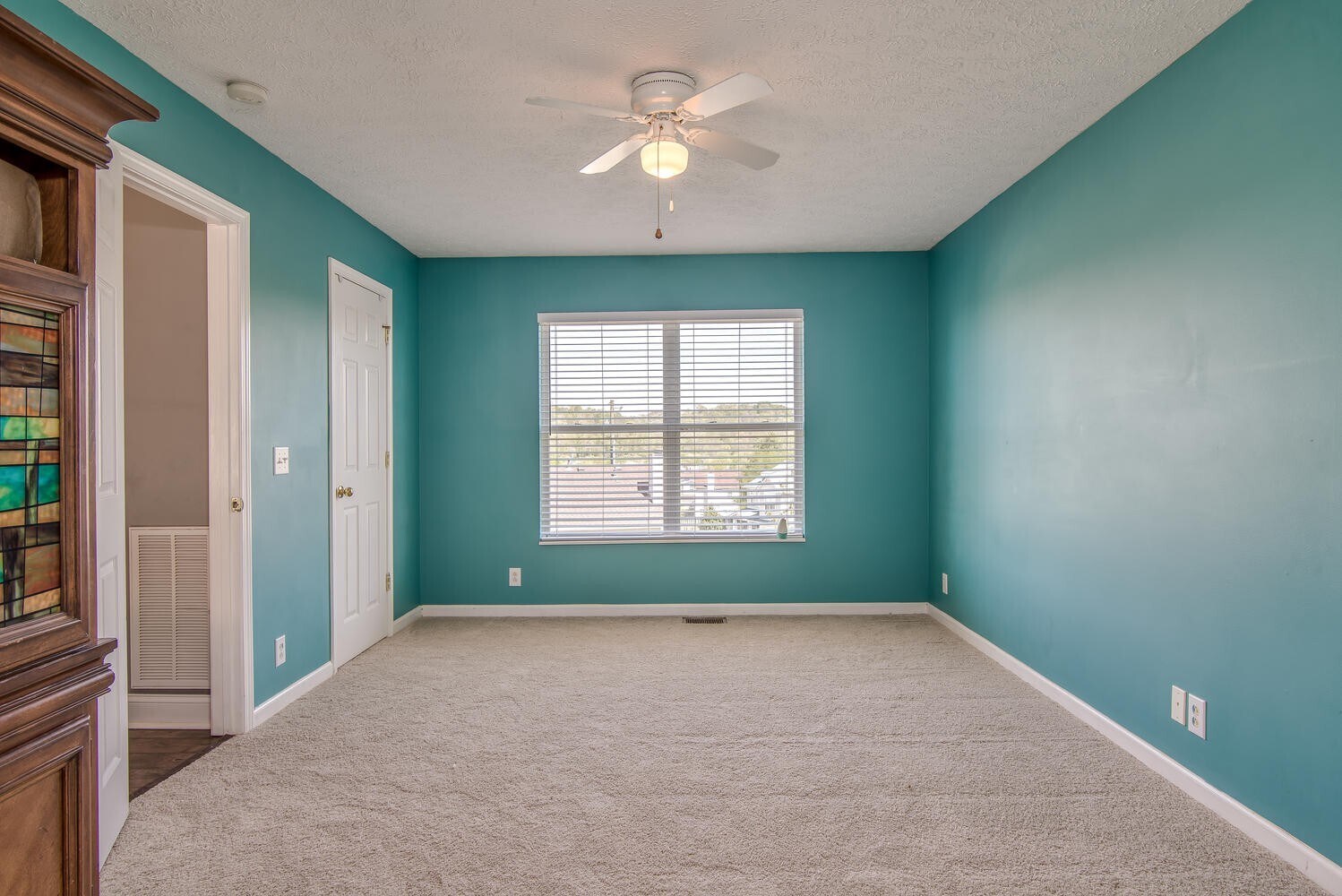 Master bedroom has been updated with Agreeable Gray paint color since this photo was taken. - 7109 Commonwealth Cir