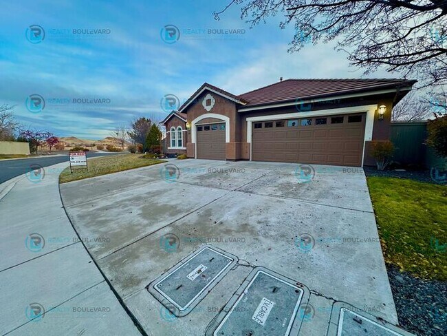 Building Photo - Open Kitchen, Expansive Living, and Covered Patio in Tranquil South Reno Near Trails, Parks & Sho...