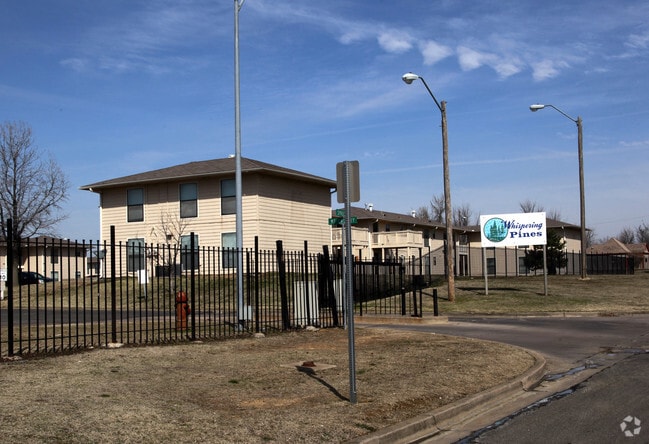 Building Photo - Whispering Pines