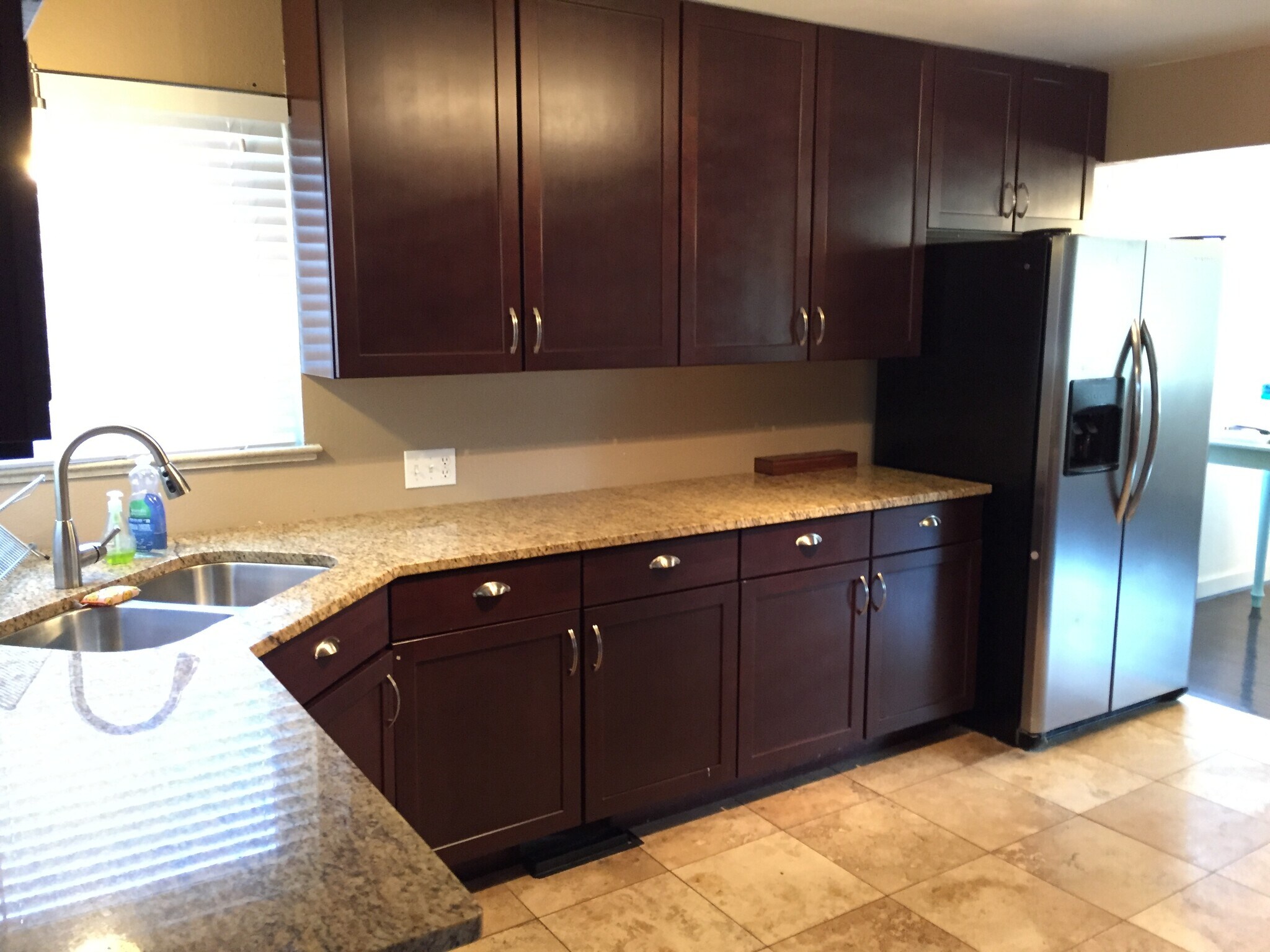 Stainless steel kitchen with tile floors and granite countertops - 4660 Perry St