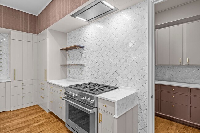 Building Photo - Rare opportunity to lease a luxury residence in The Nolen on Queens Road