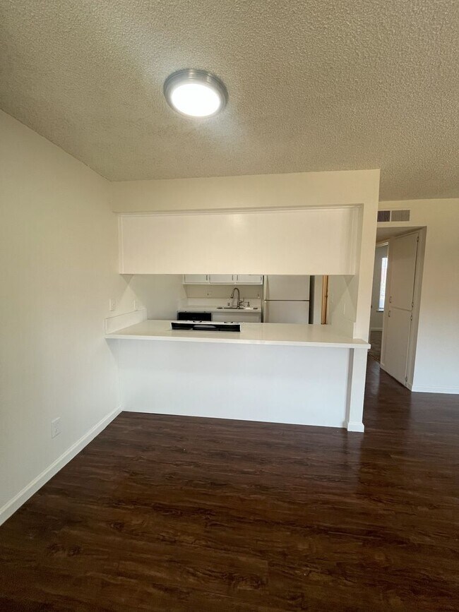 Building Photo - Upstairs unit Available Soon!
