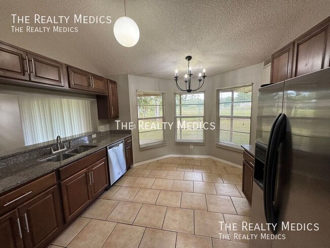 Building Photo - 1004 N Magee Creek Ct