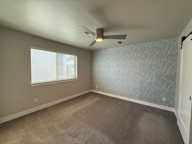 Building Photo - Modern Townhouse with Rooftop Deck & Mountain Views Near Sloan’s Lake!!