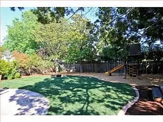 Building Photo - "Elegant 5-Bedroom Oasis with 4 Luxurious ...