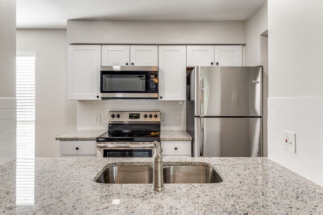 Building Photo - Creekside Condominumums