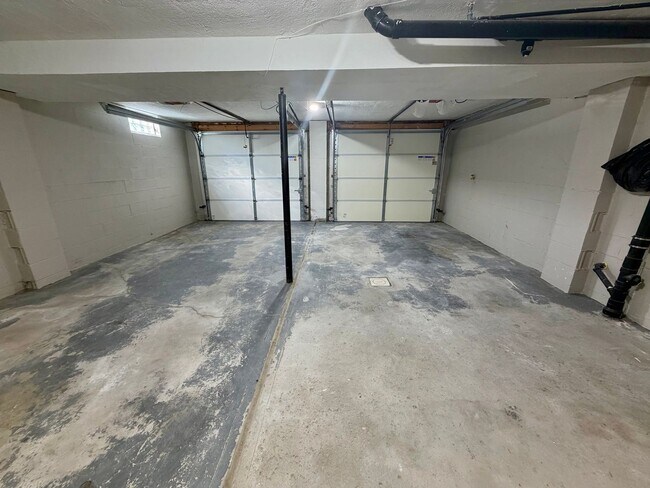Building Photo - Modern Comforts Await: Spacious Rental with 2-Car Garage, Private Office, and Finished Basement w...
