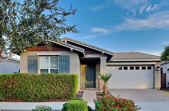 Building Photo - Stunning 4-Bed + Den Eastmark Home with Modern Upgrades Throughout