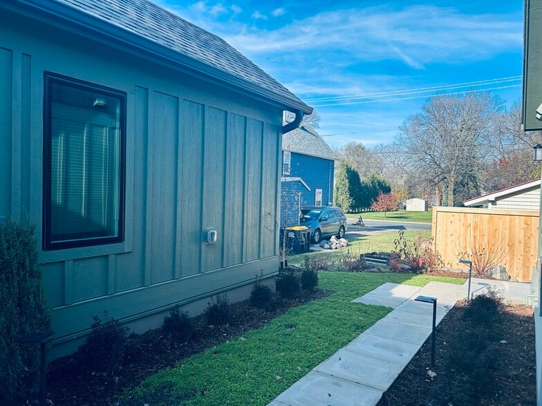 View of outside of unit, looking northwest. - 702 Union St