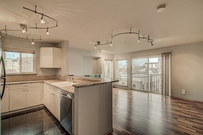 Building Photo - Top floor corner one-bedroom in the heart of it all, don't miss out, tour today!