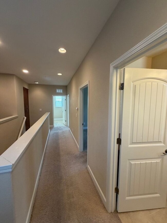 Building Photo - Solar Home with EV Garage Charging. 4 Bedroom Home with Downstairs Bedroom and Full Bathroom.