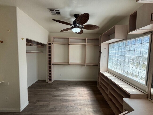 Building Photo - Gated Green Valley Ranch Townhome | 2 Bed | 2.5 Bath | 2-Car Garage