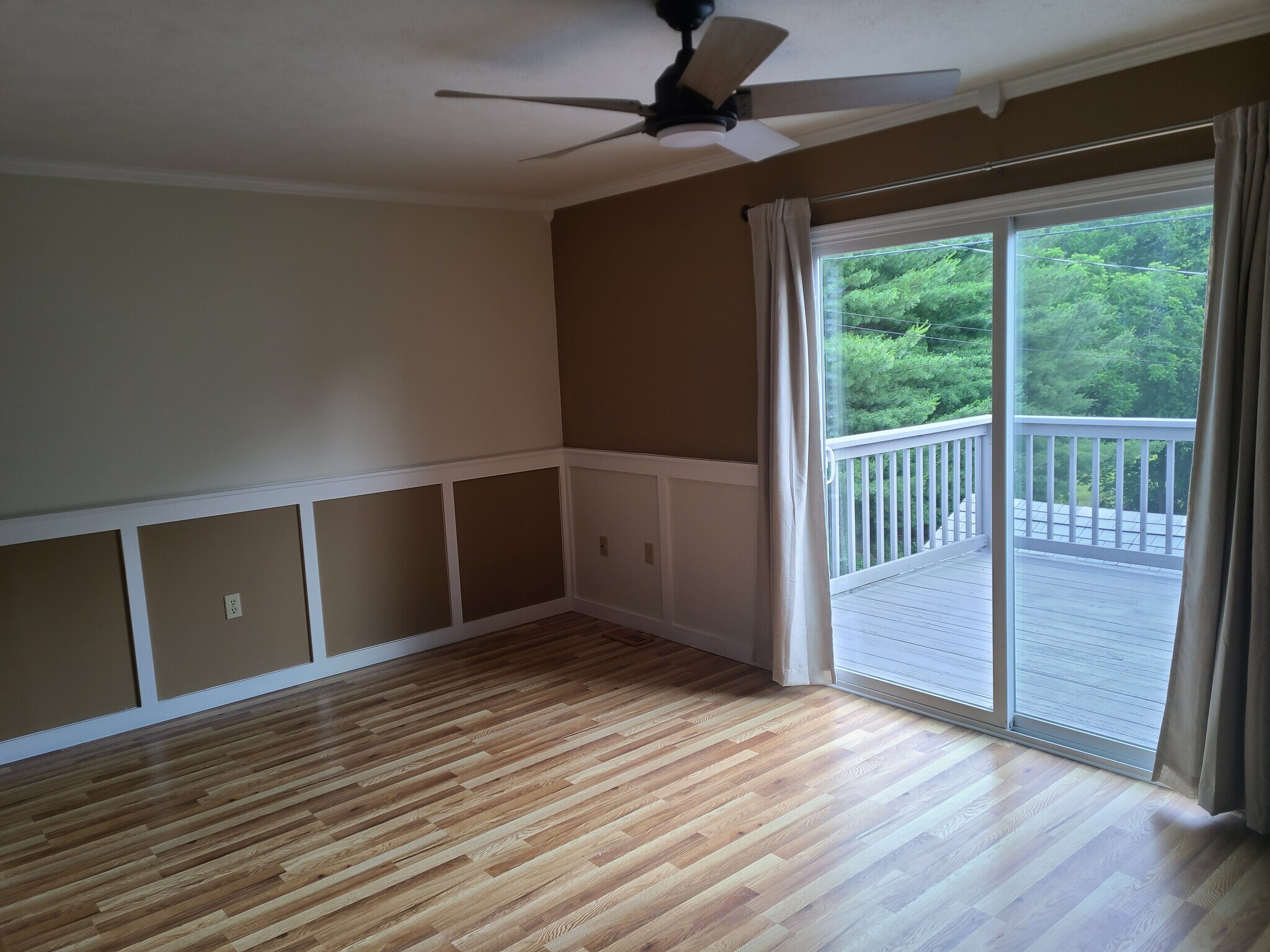 living room and rear deck - 1528 Old Oak Ln