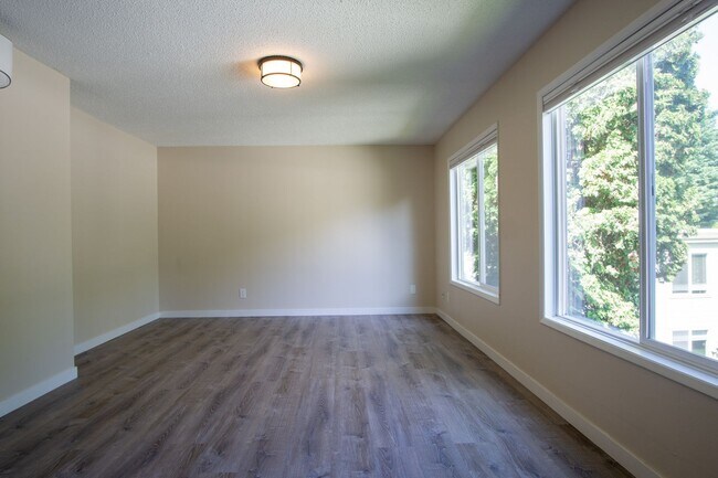 Building Photo - Spacious 2 Bedroom with Stylish Updates + A/C, W/D, D/W!