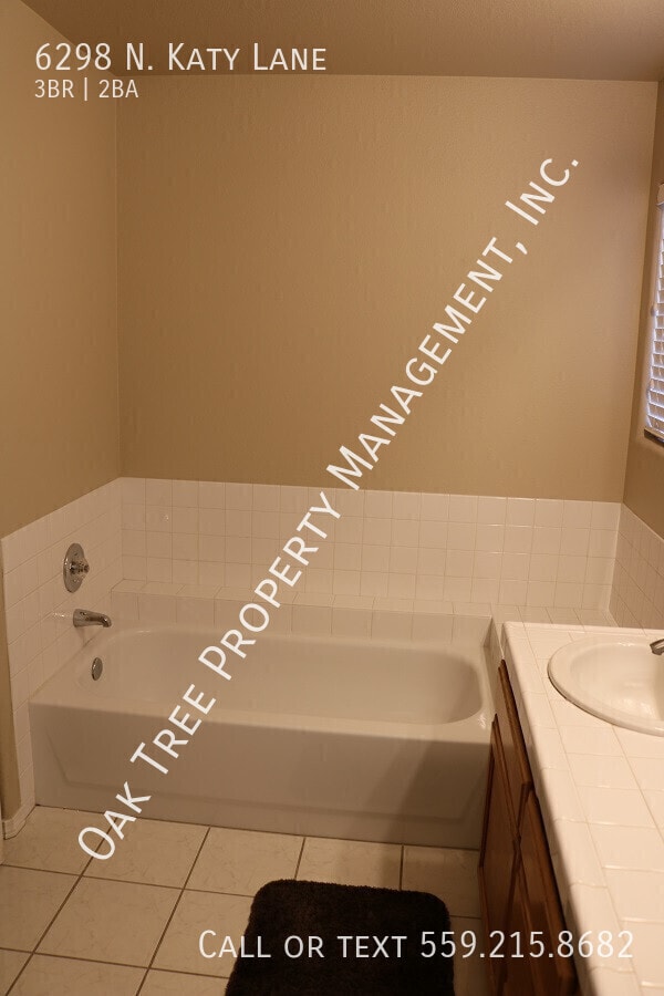 Building Photo - 6298 N Katy Ln