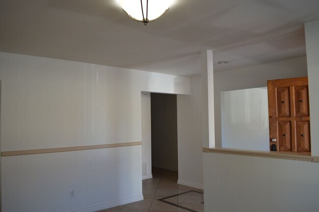 Building Photo - Four Bedroom, Two Bathroom Single Story Home With Two Car Garage