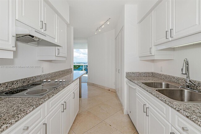 Building Photo - 4779 Collins Ave