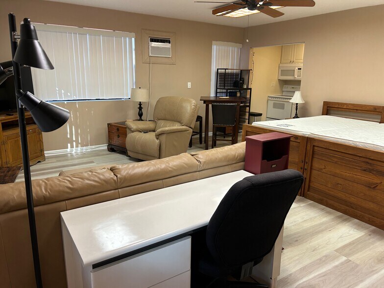 desk and office chair - 630 NW 7th Ave