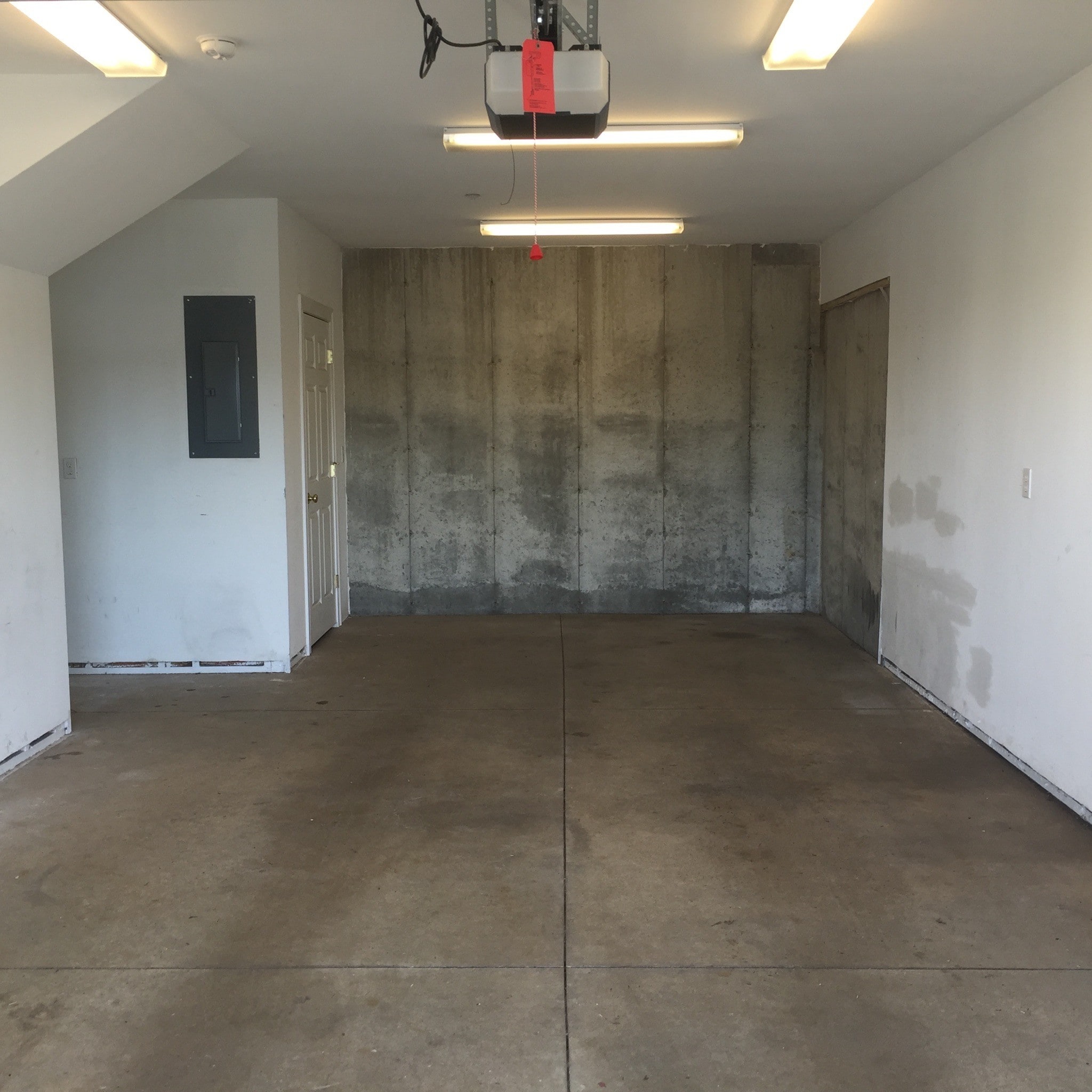 Deep garage with storage under stairs - 14 Heron Cove Dr