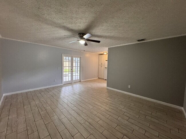 Building Photo - Updated Home with Spacious Backyard