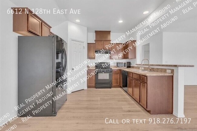 Building Photo - 6612 N 128th E Ave