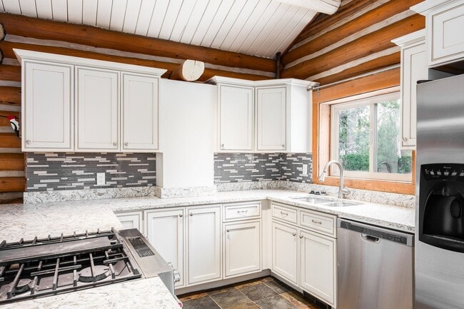 Building Photo - Updated Log Cabin in Park City — Modern Co...
