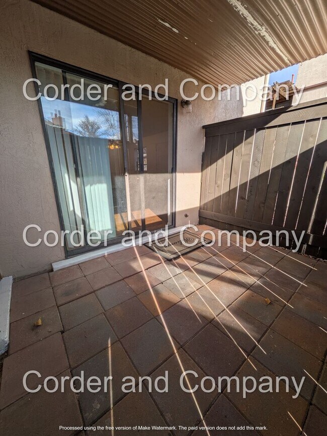 Building Photo - Charming town home 2Bedroom 2Bath Downstairs unit located in the Del Norte High School district.